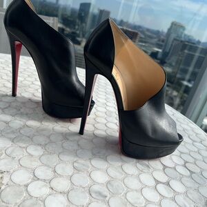 Black Patten- red bottoms form heels worn twice